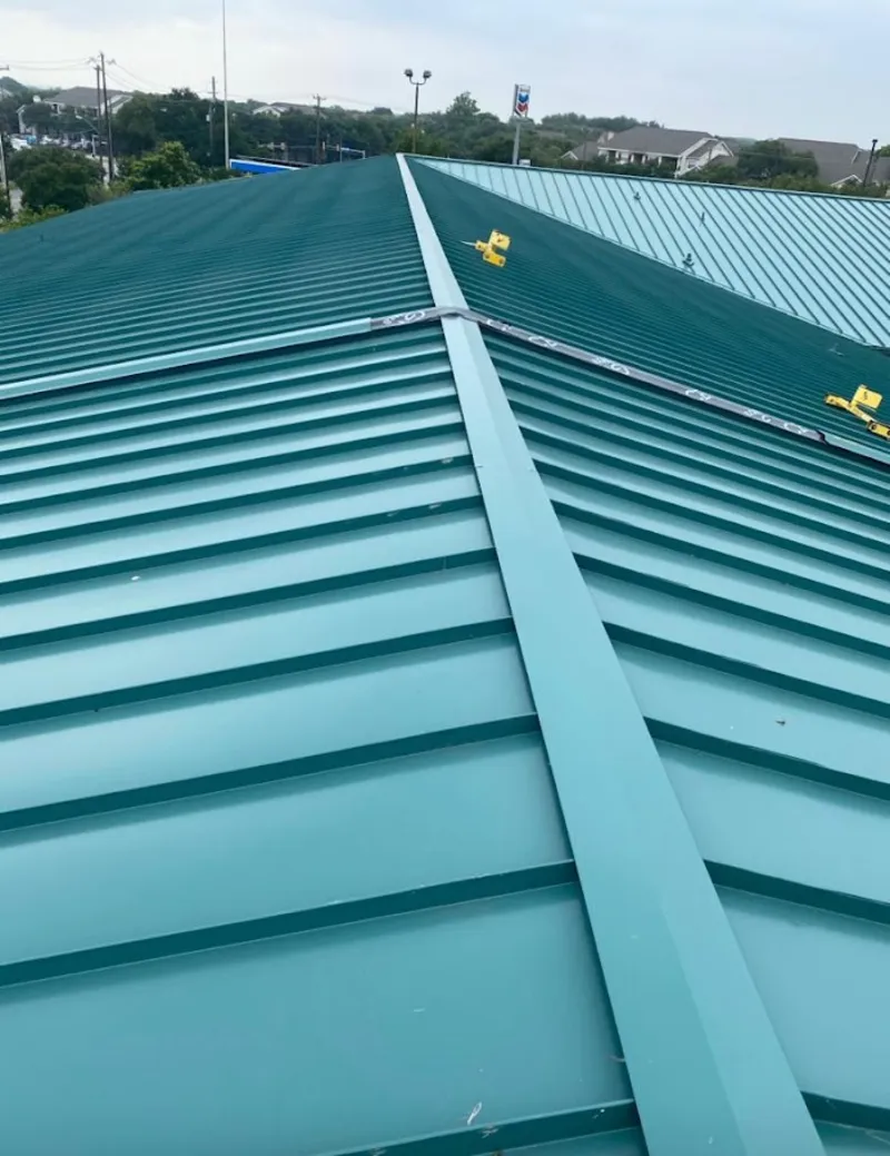 Green commercial metal roof ridge and valley for Metal Roof Repair in New Franklin