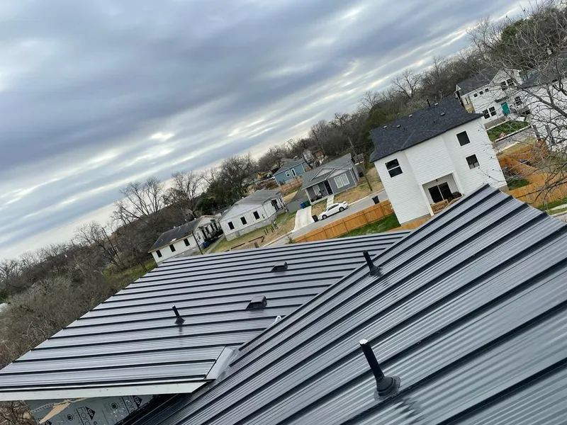 Standing seam metal roof panels with vents for Skylight Repair in New Franklin
